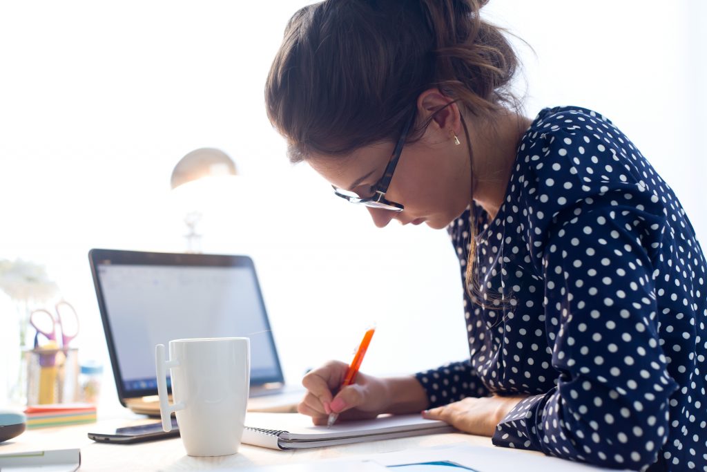 Girl studying with laptop