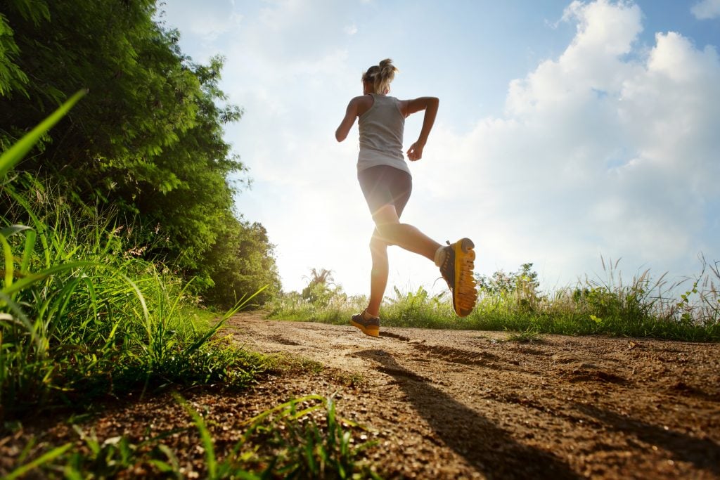 Female runner in a field