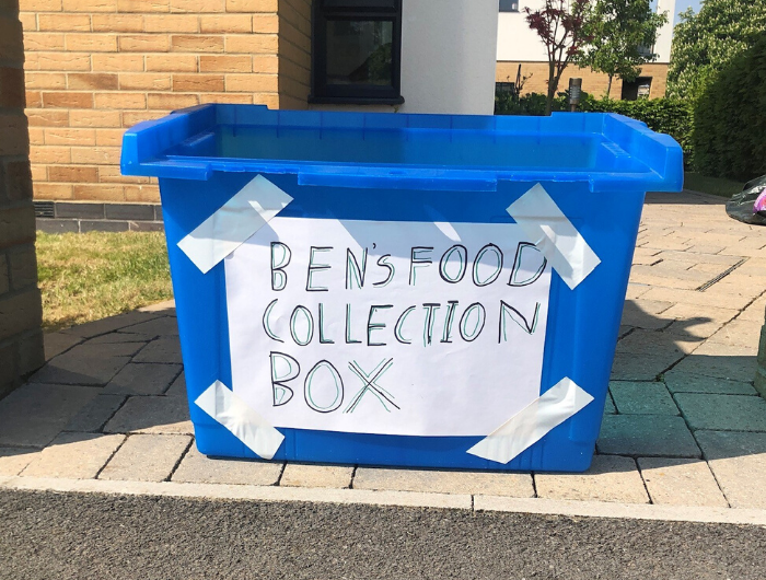 Blue food collection box with sign