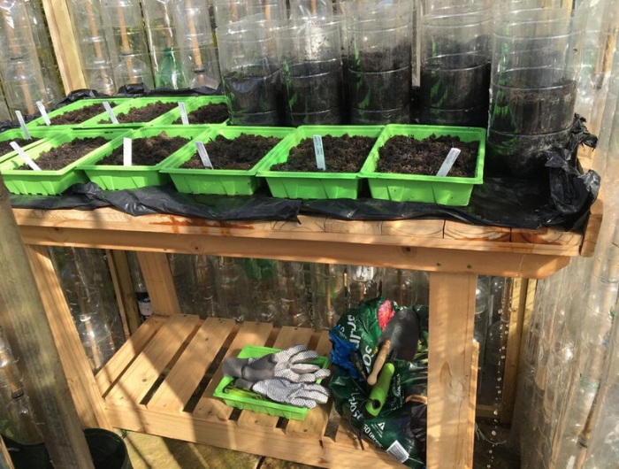 Planting table with green boxes