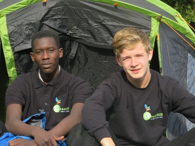 Greenhill group shot in a tent