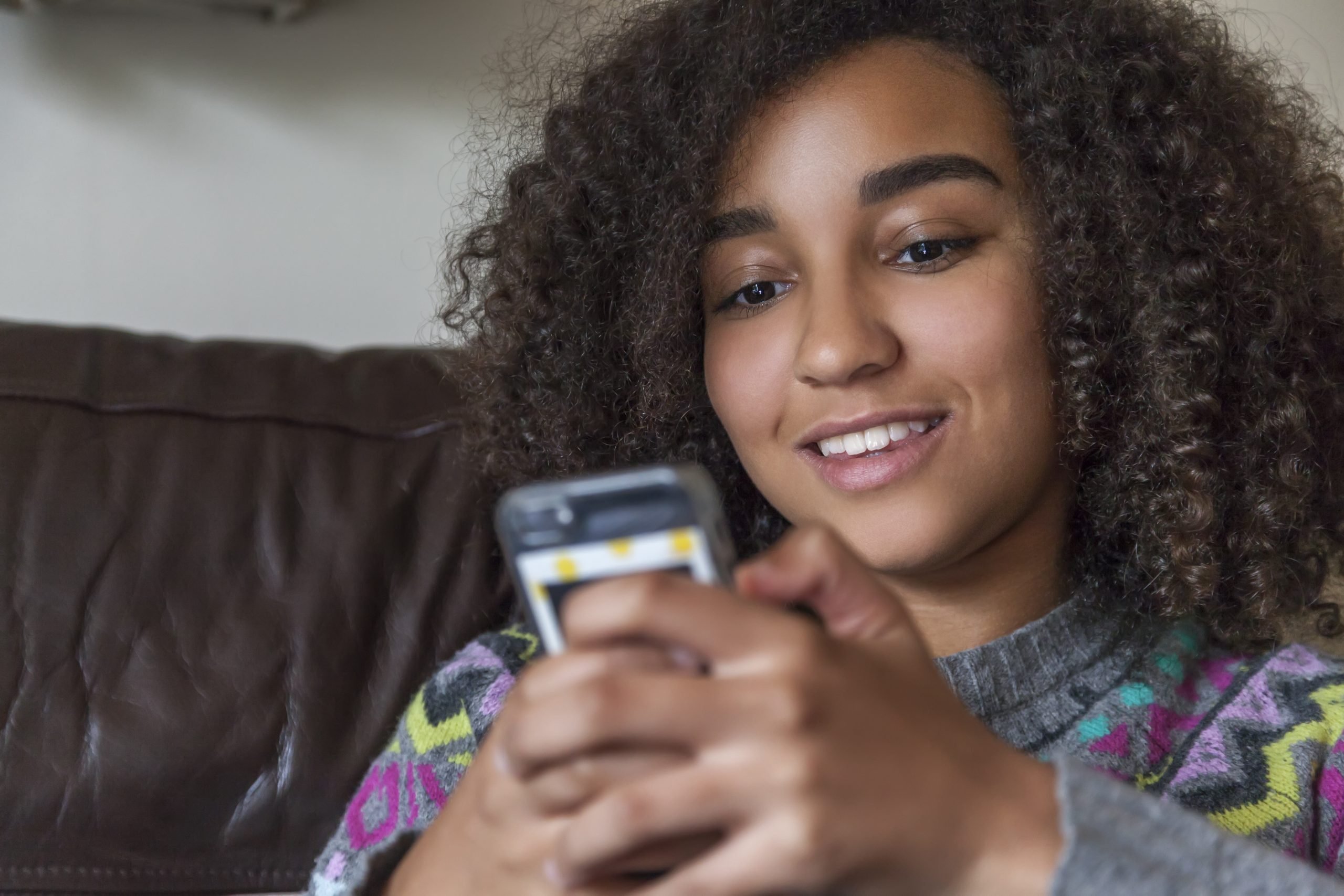 Young girl on mobile phone