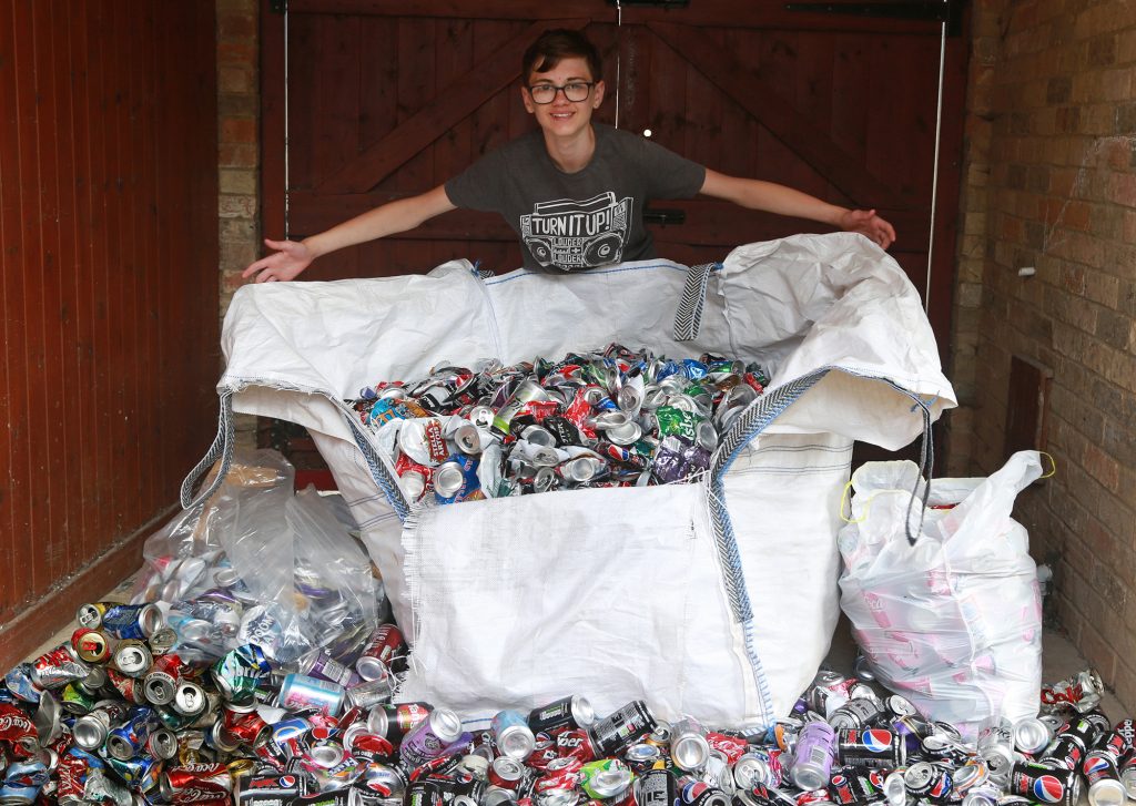 Frankie with a large bag of collecting rubbish for recycling