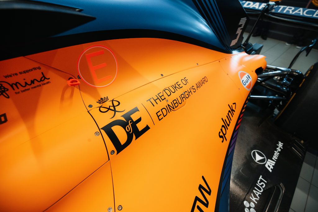 DofE logo on orange McLaren car