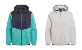 Two hooded fleece jackets displayed side by side. The left jacket is colour‑blocked with a dark navy upper section and turquoise textured lower section. The right jacket is light grey with a soft textured fleece and matching hood. Both have full‑length front zips and long sleeves.