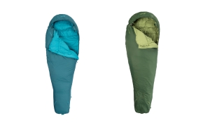 Two mummy‑style sleeping bags displayed upright on a white background. The sleeping bag on the left is teal with a bright blue inner lining, partially unzipped to show the interior. The sleeping bag on the right is olive green with a lighter green inner lining, also partially unzipped. Both products are from Vango.
