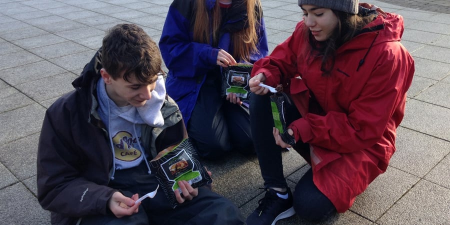 Young people eating Wayfayerer food