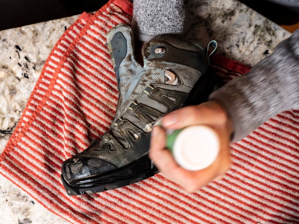 Walking boots being cleaned