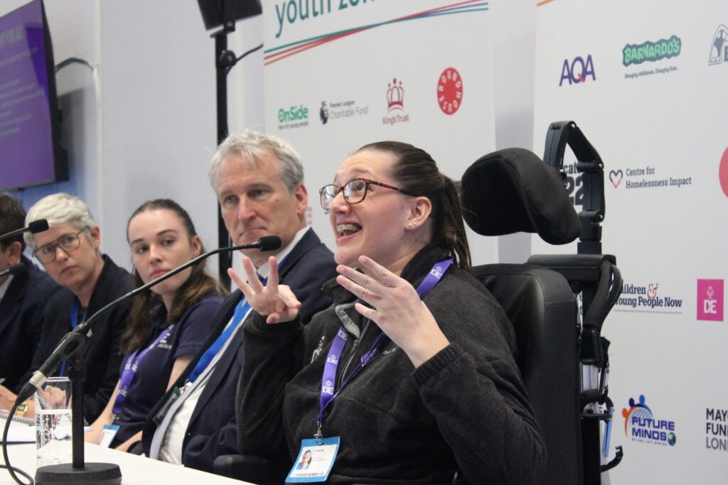 Youth Ambassador Evie talking as part of a panel at the Conservative party conference.