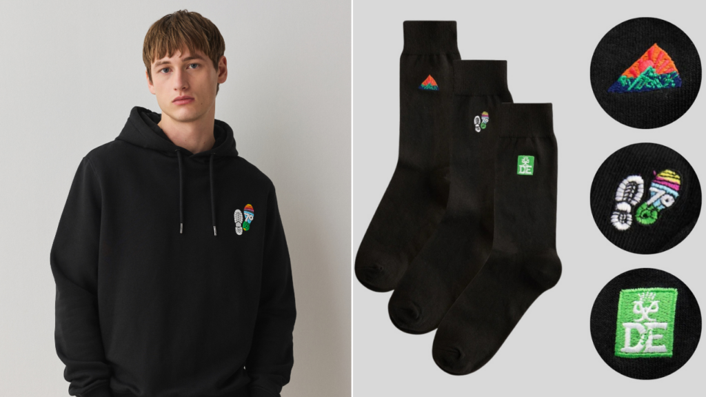 Black hoodie and three-pack of black socks featuring embroidered DofE-themed designs, including a colourful bootprint, mountain motif and DofE logo.