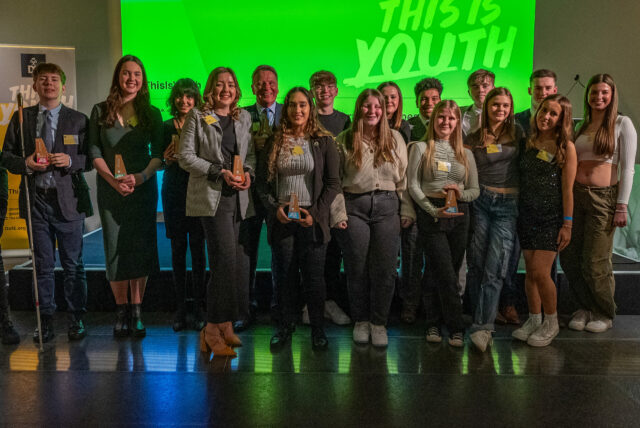 This is Youth 2023 winners holding their awards.