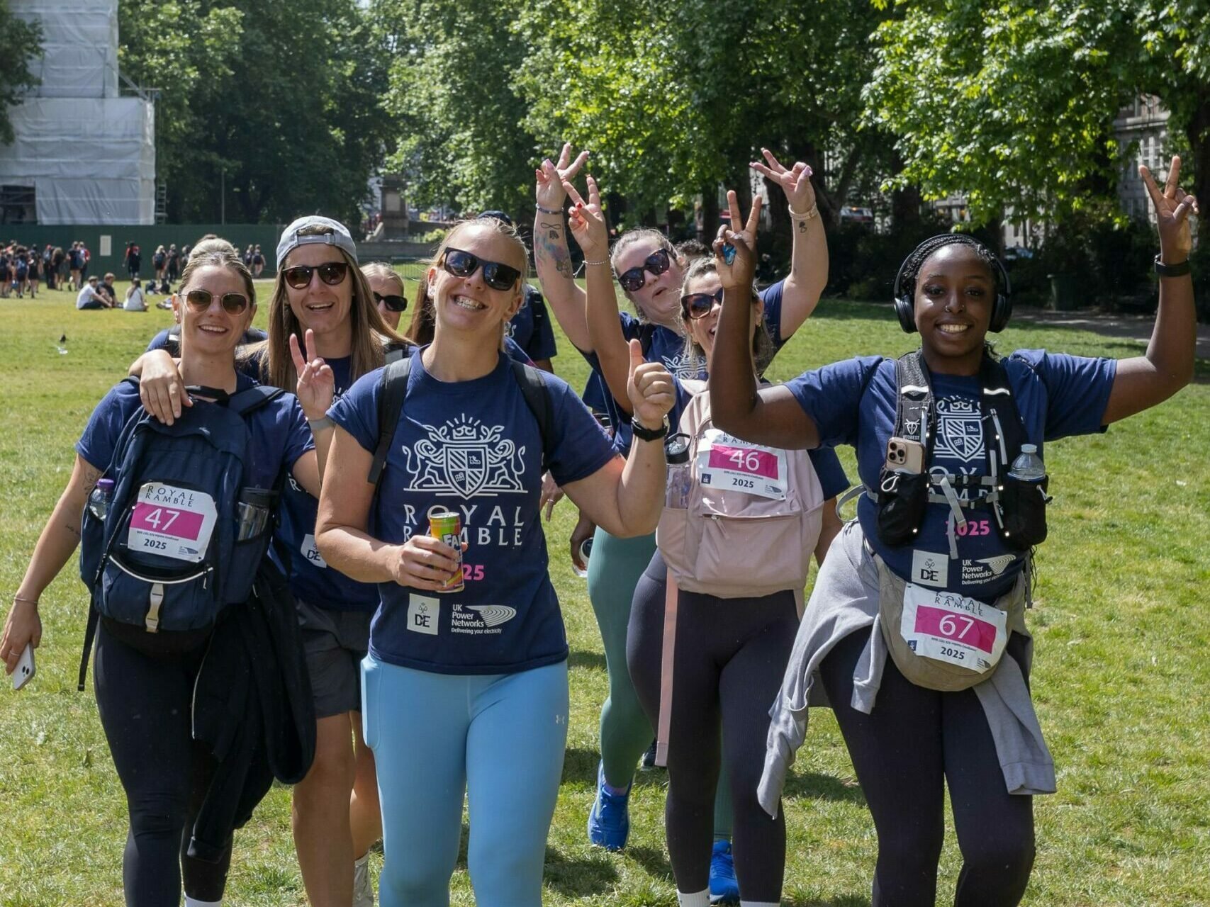 A group of people doing a charity walk together smiling