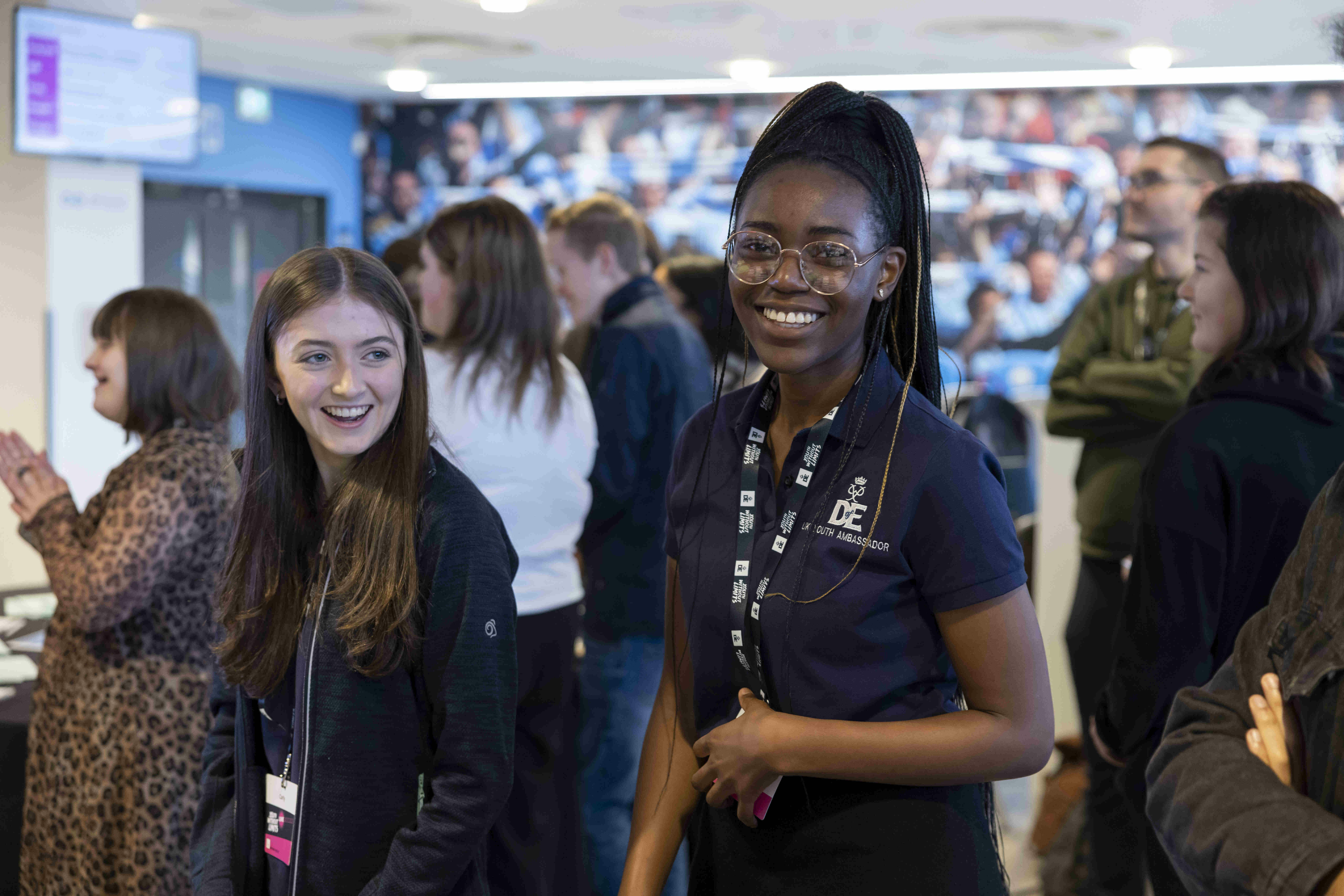 Two young people smiling at Youth Without Limits Live.