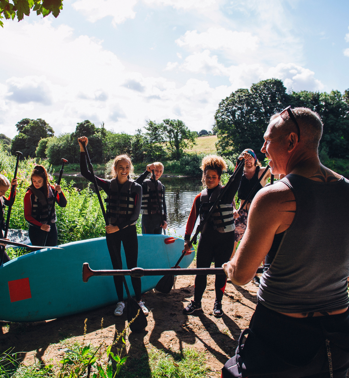 Paddleboarding group with Leader