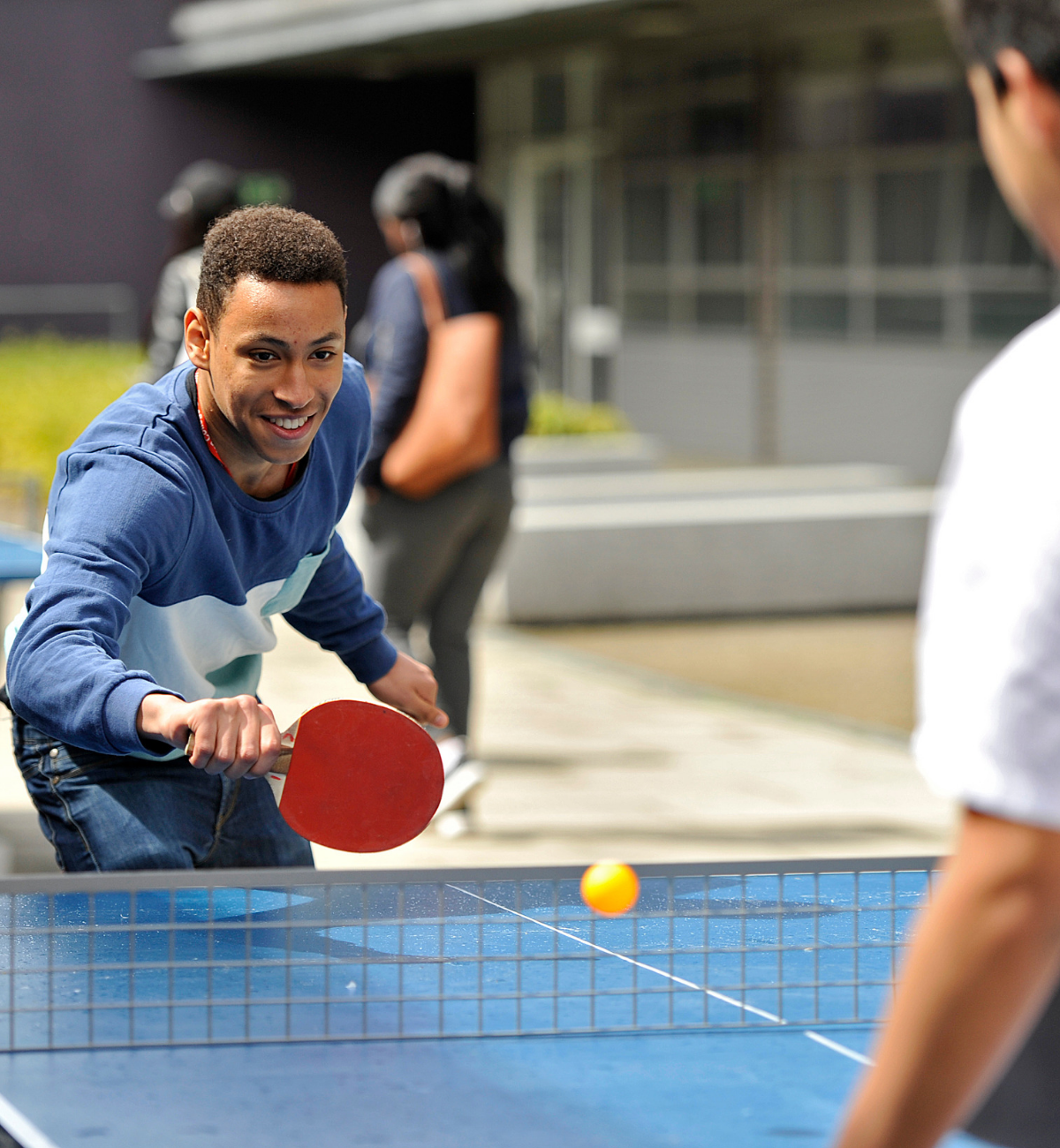 Young man playing table tennis