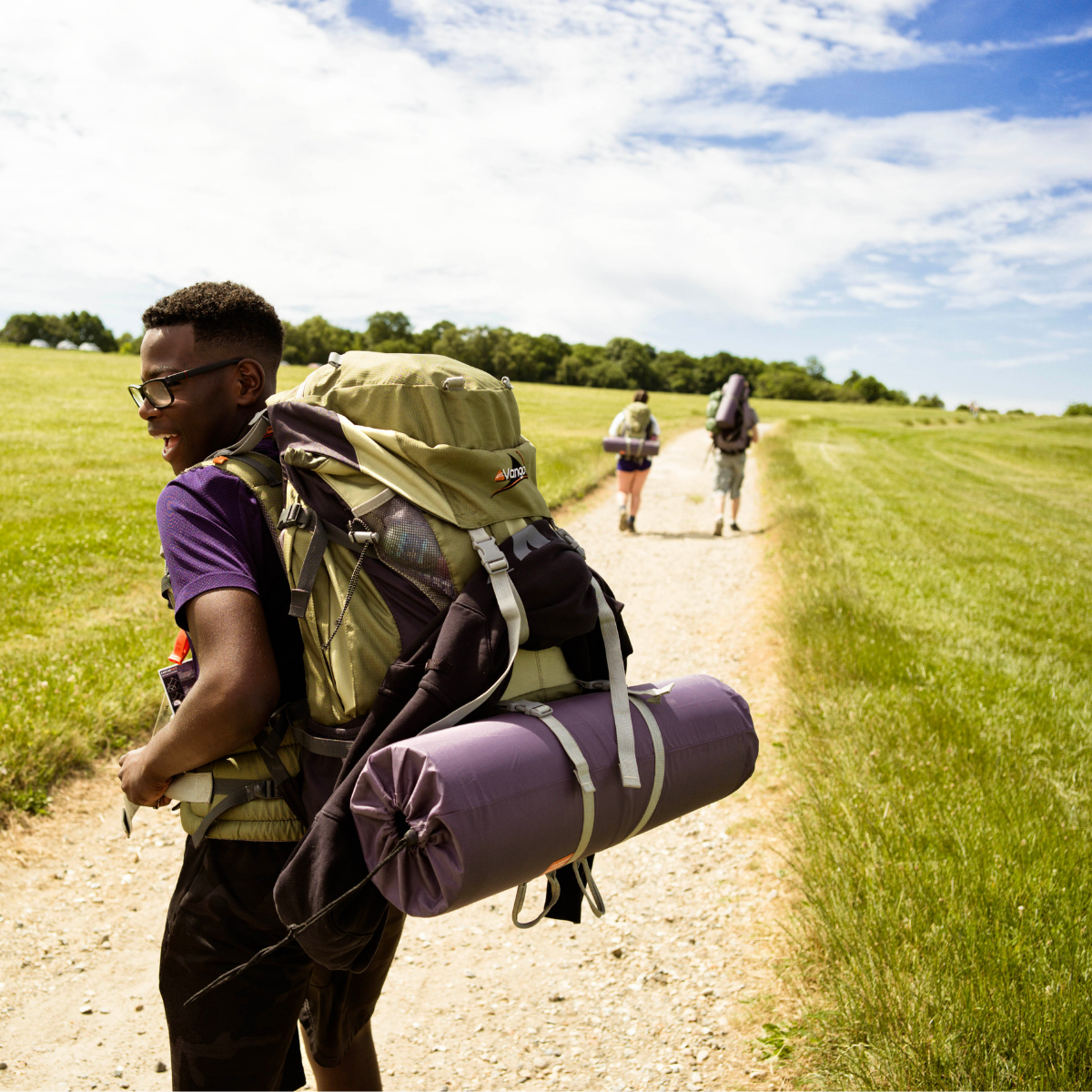 Young man on expedition with large rucksack