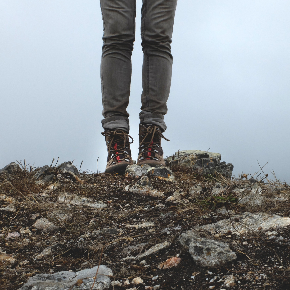 Pair of legs in walking boots