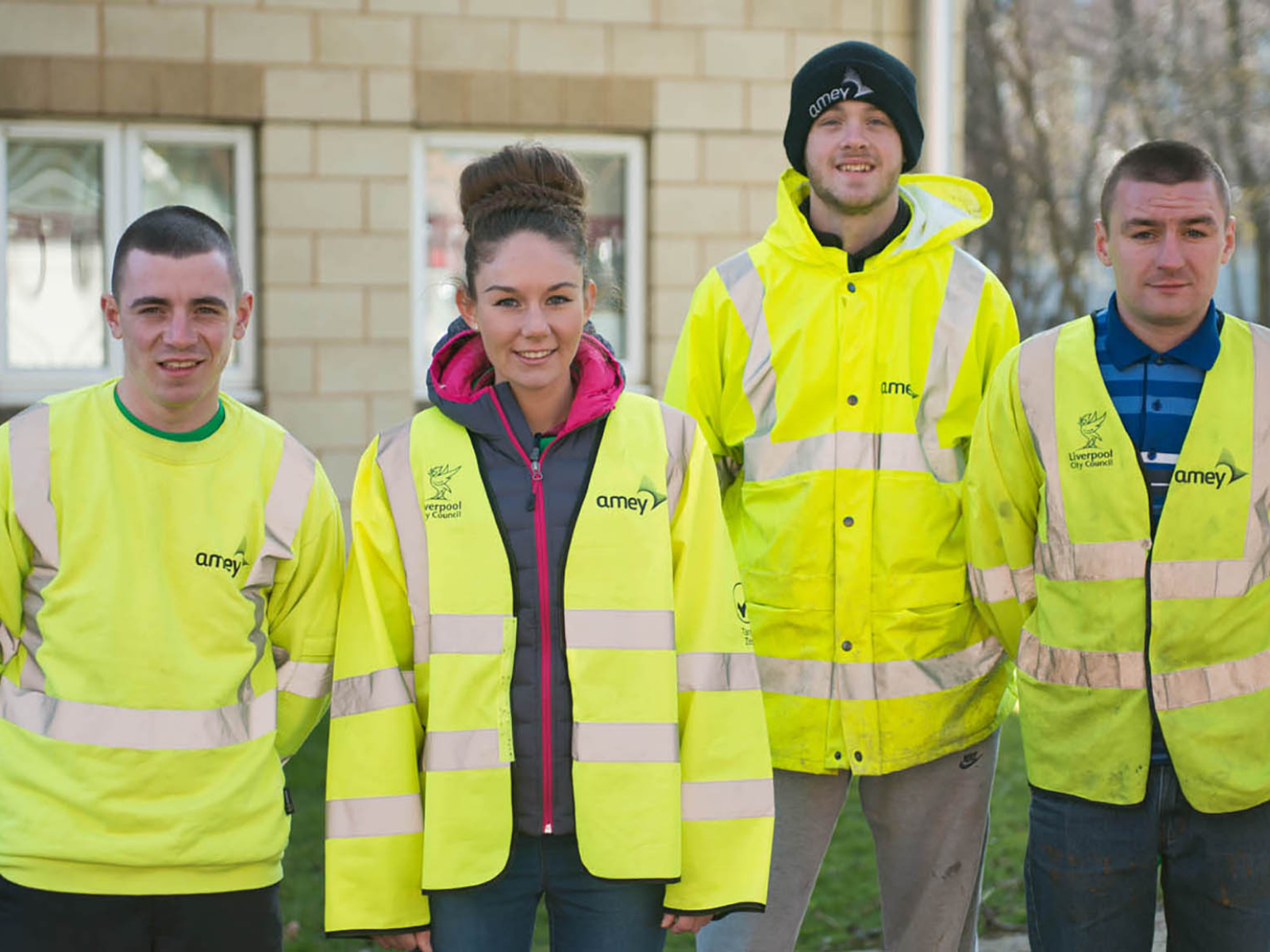 Four Amey apprentices in high vis jackets