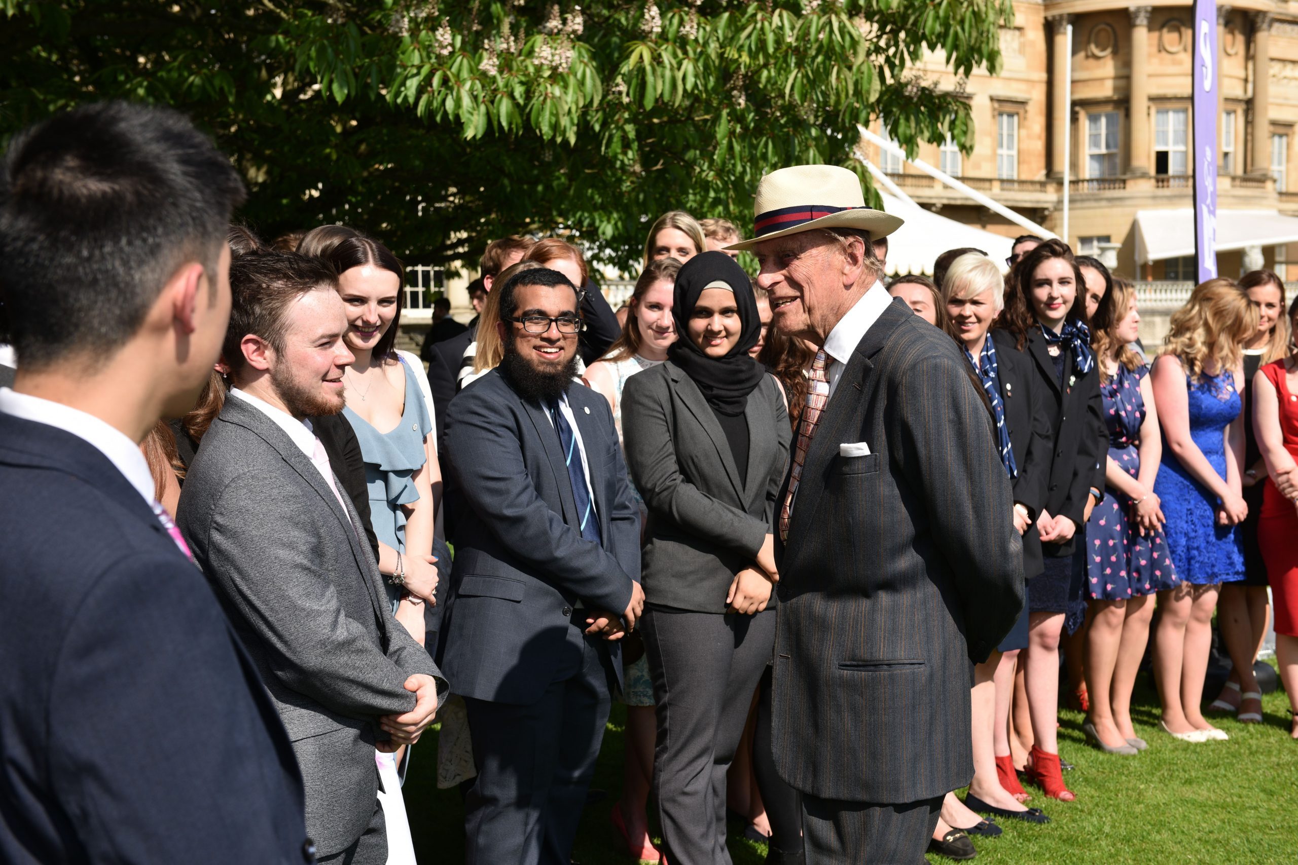 HRH Prince Philip talking to group of young people